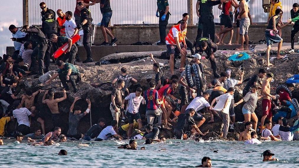 Swimming refugees near Gibraltar I 2026 - seen on tass.com